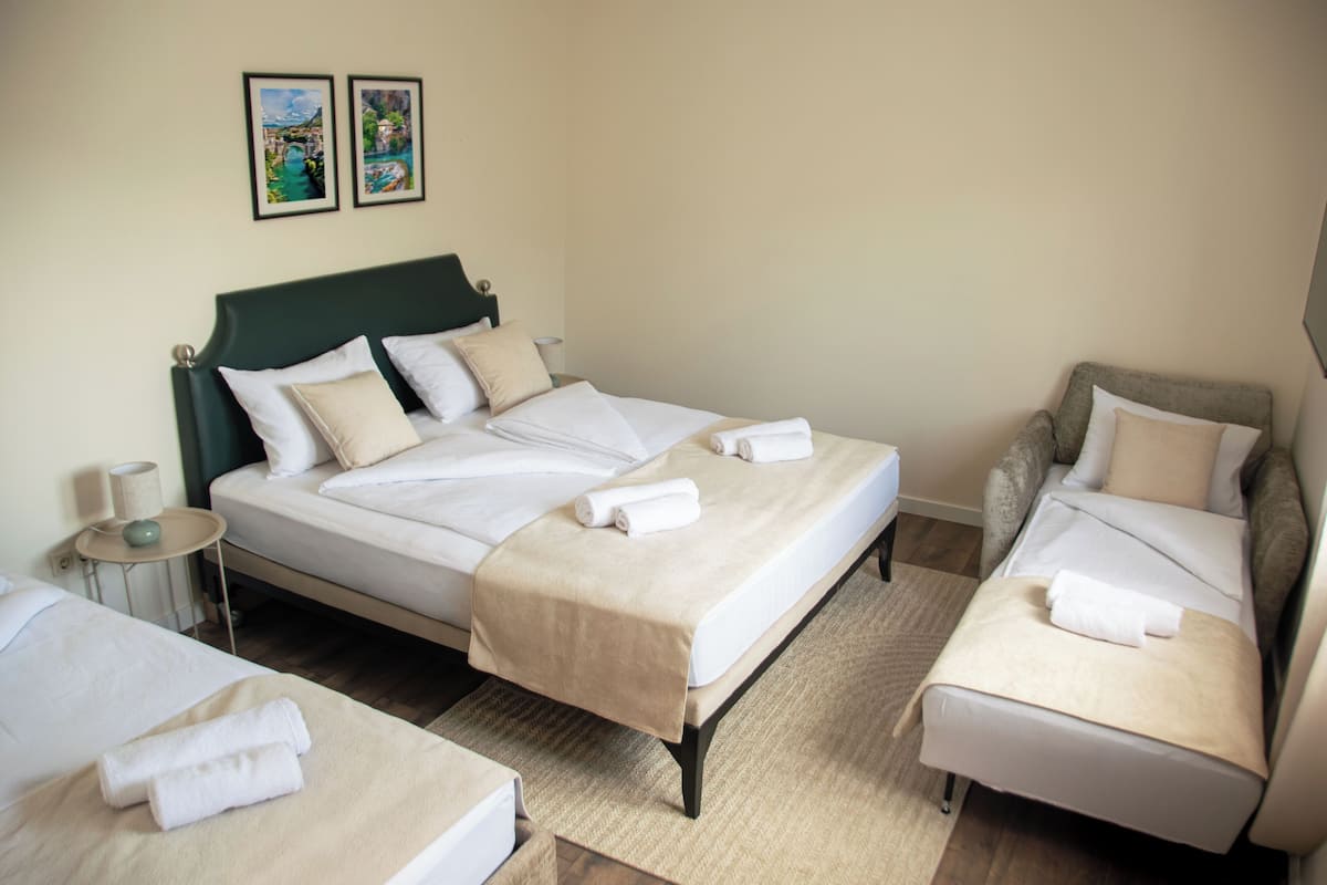Family Quadruple Room | Minibar, desk, laptop workspace, iron/ironing board (on request)