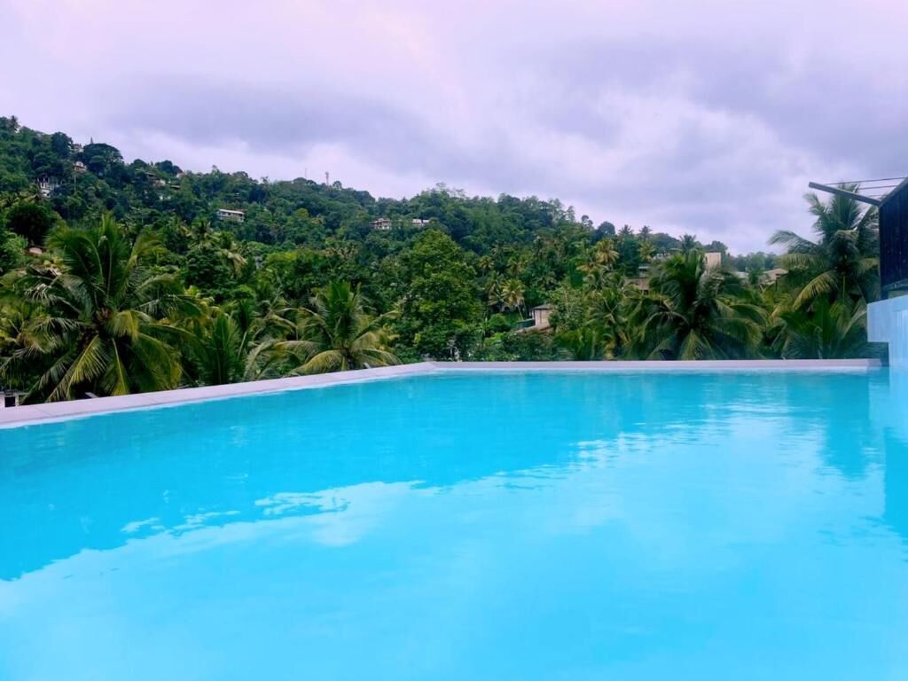 Deluxe Double Room, Balcony, Mountain View | Pool | Outdoor pool