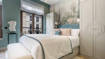 1 dormitorio, tabla de planchar con plancha, wifi y ropa de cama