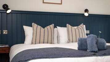 Ropa de cama de alta calidad y tabla de planchar con plancha