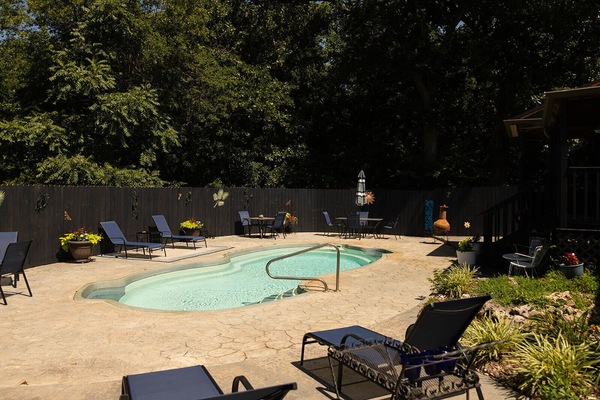 Private outdoor pool with fenced in back yard