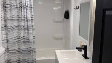 Hair dryer, towels, soap, shampoo