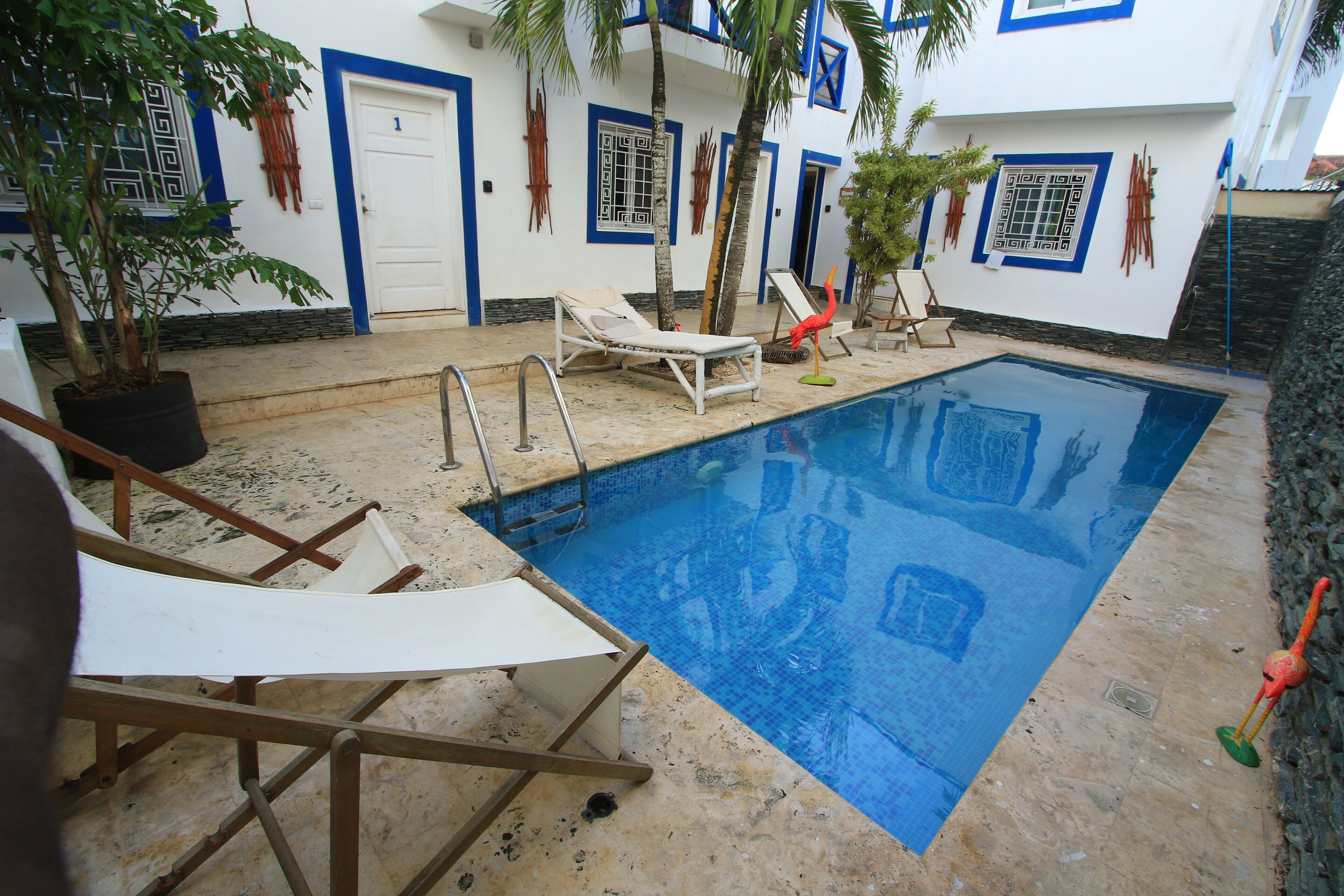 6 outdoor pools, open 10:00 AM to 10:00 PM, pool loungers