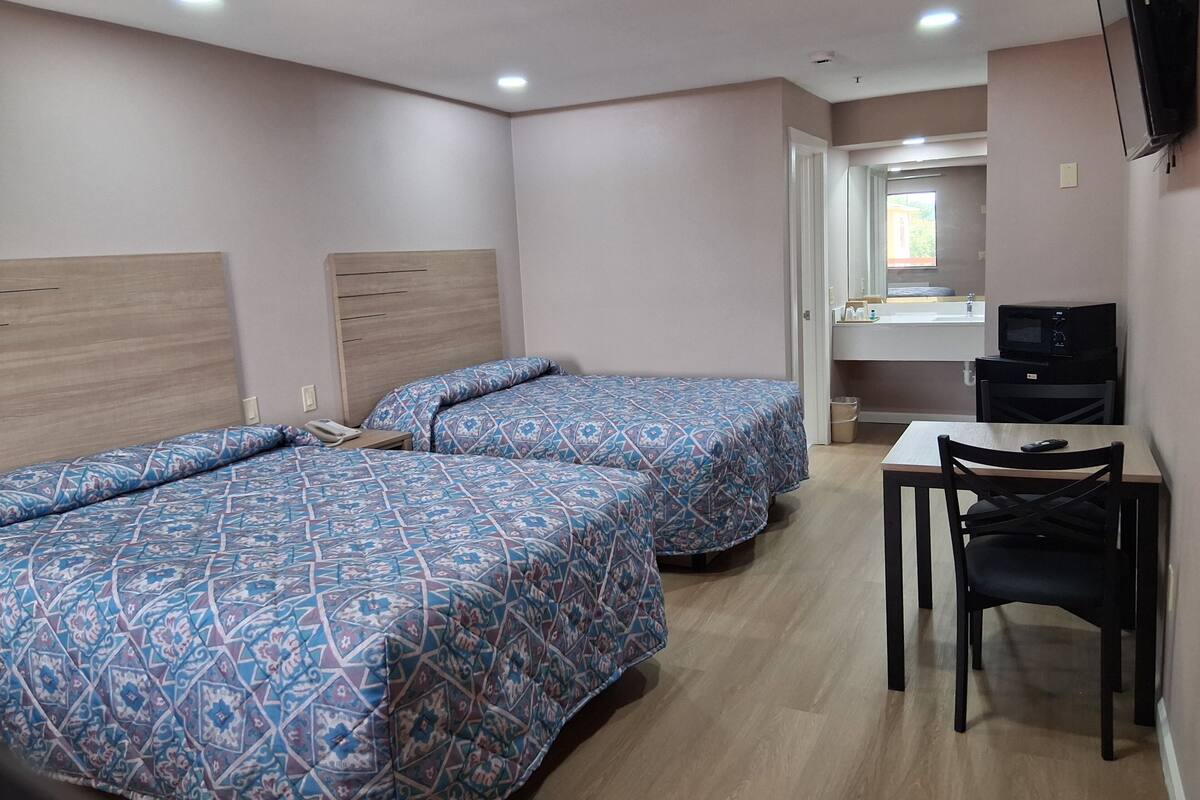 Standard Double Room | Desk, iron/ironing board (on request), WiFi (free), bed sheets