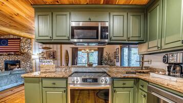 Coffee/tea maker, fridge, microwave, oven