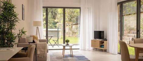 Deluxe-Apartment, 1 Schlafzimmer | Wohnbereich