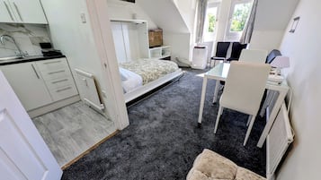 1 dormitorio, tabla de planchar con plancha, wifi gratis y ropa de cama