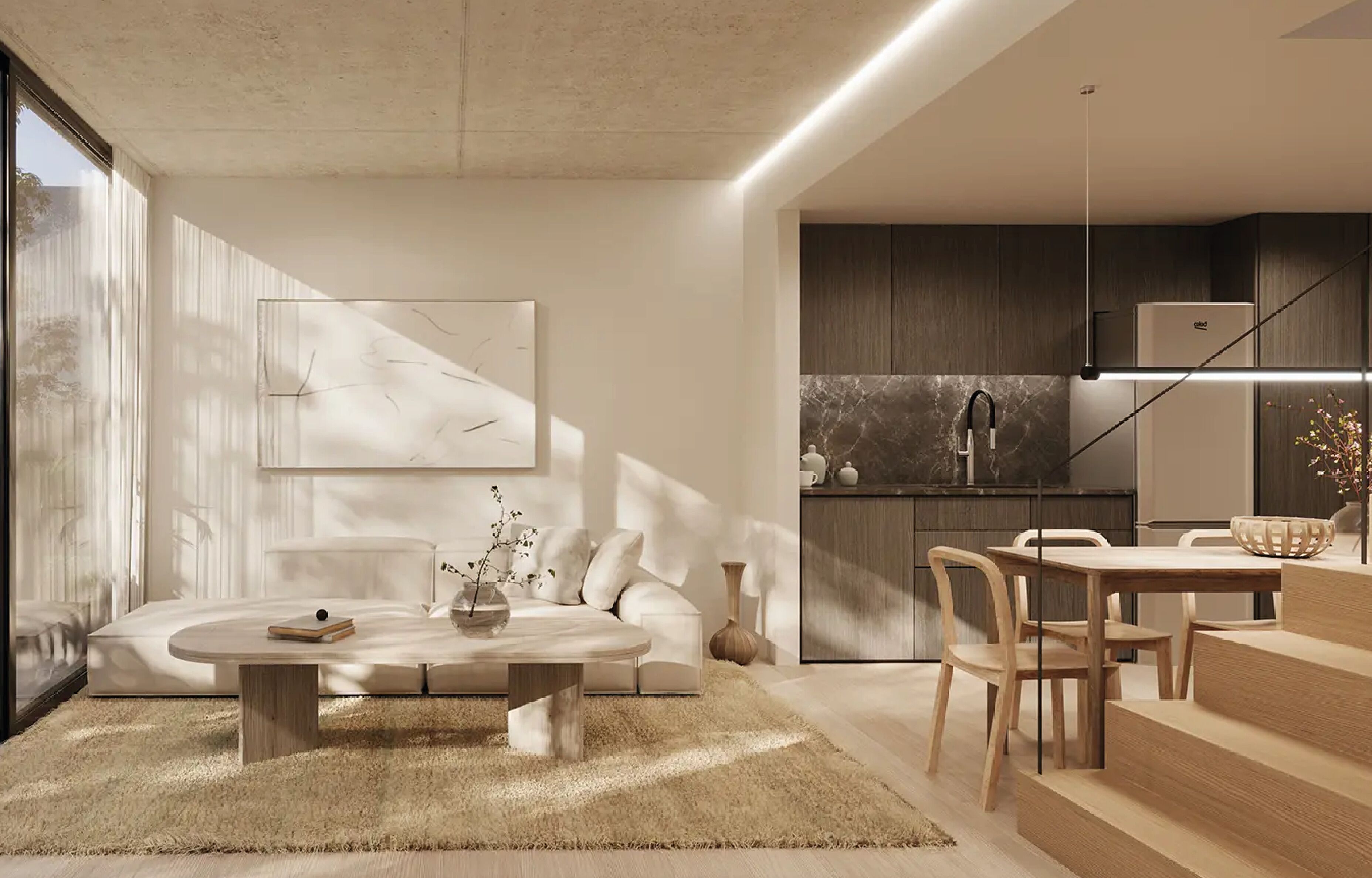 A modern interior with a living area, dining space, and kitchen.
