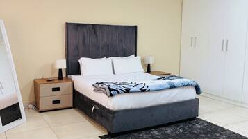 Deluxe Double Room, Private Bathroom, Pool View | Desk, soundproofing, iron/ironing board, free WiFi