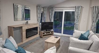 Holiday Lodge with fishing set in tranquil surroundings