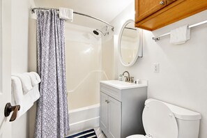 Hair dryer, towels, soap, toilet paper