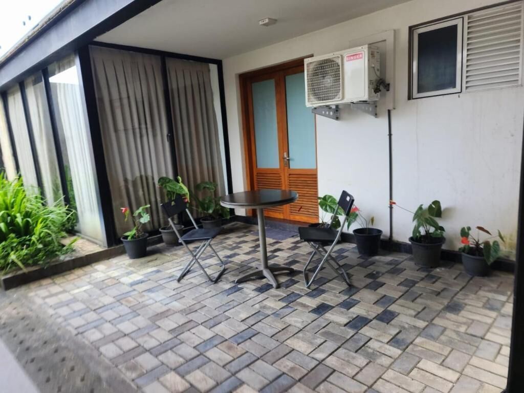 Habitación doble Deluxe, balcón, vista al lago | Restaurante al aire libre