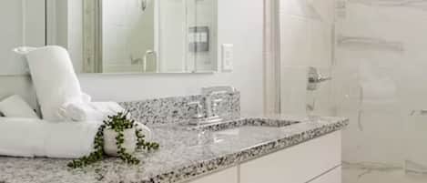 Hair dryer, towels, soap, toilet paper
