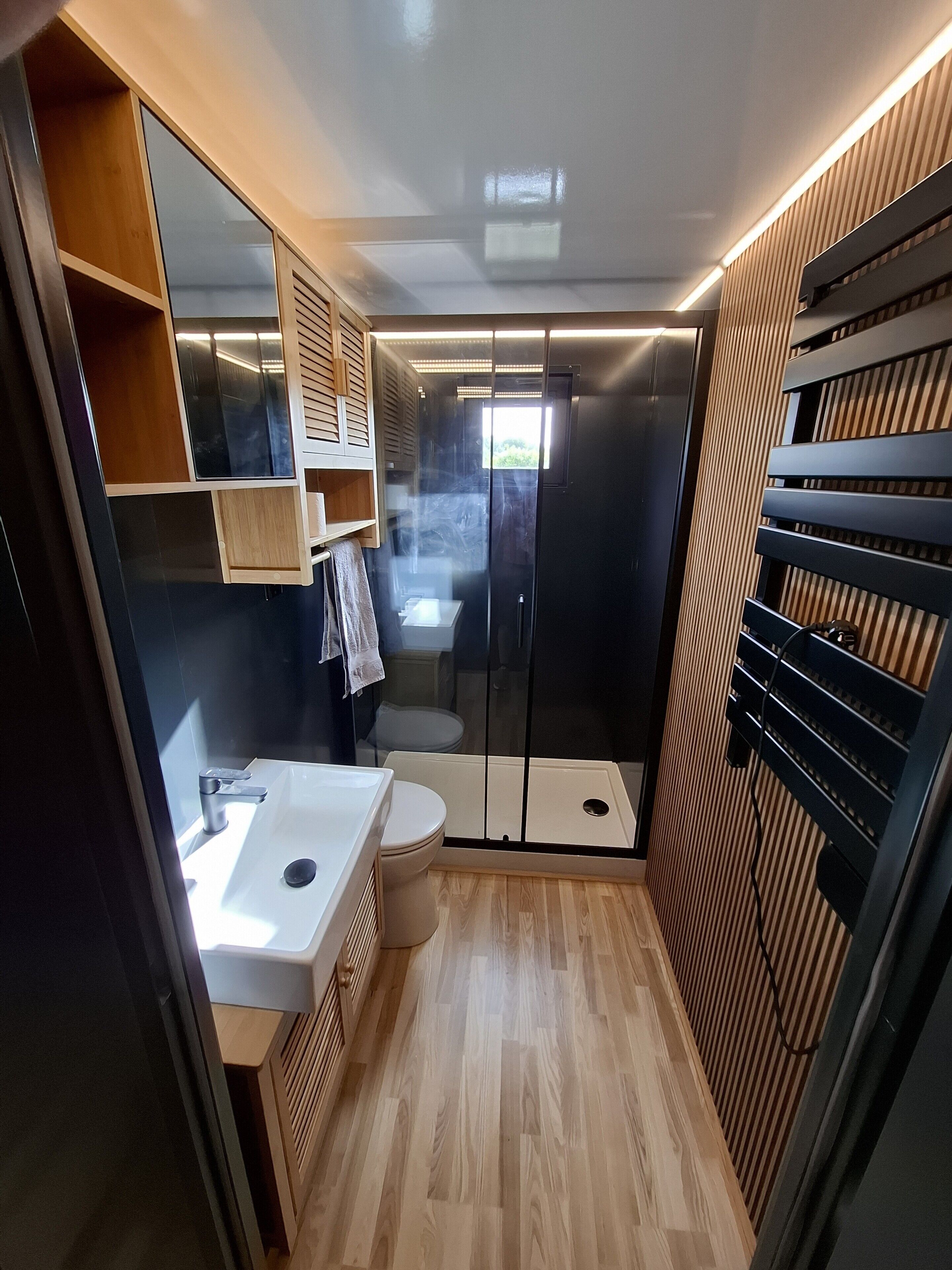 Shower, towels, soap, toilet paper