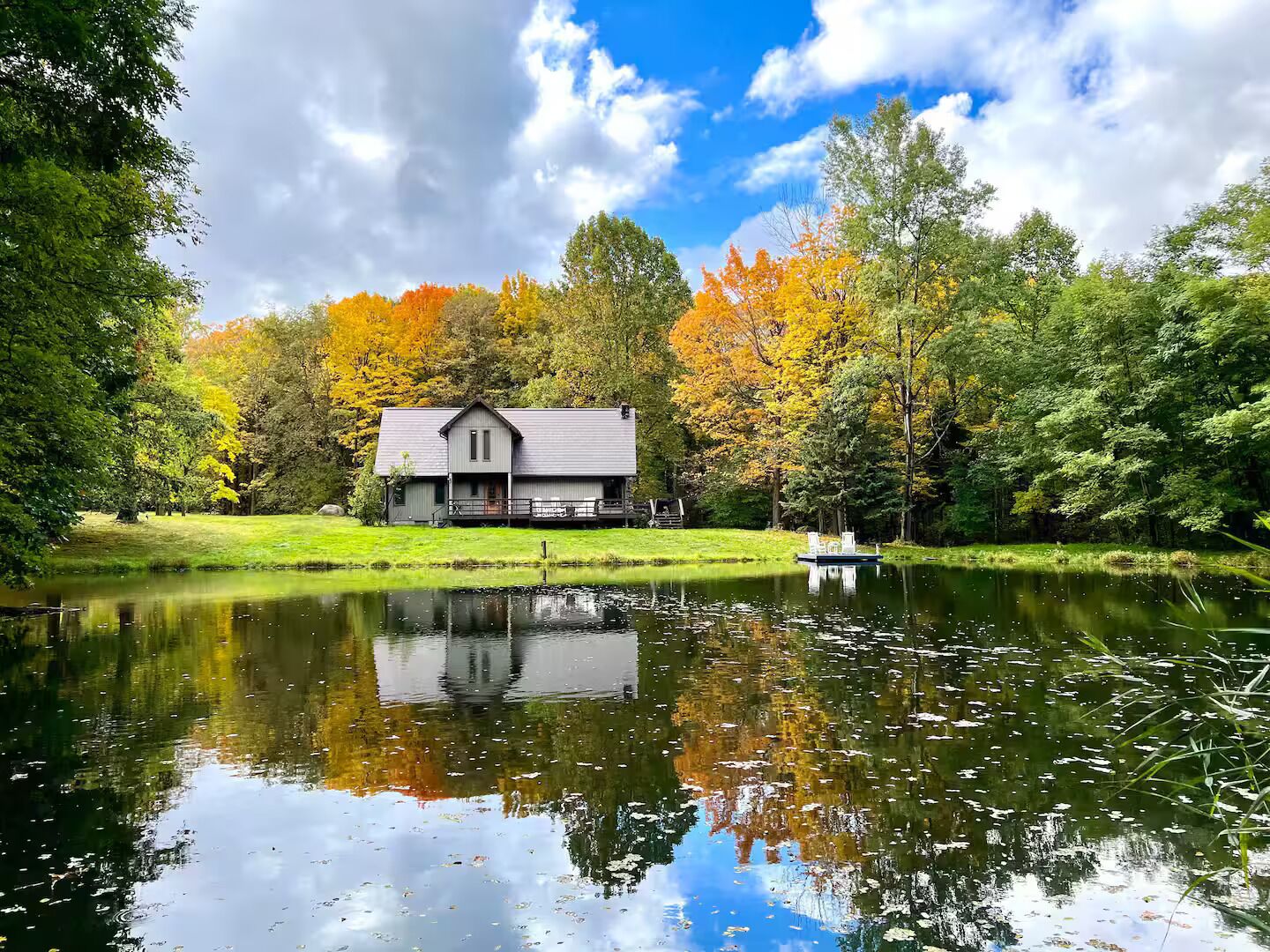 Early fall view of the house from across the pond