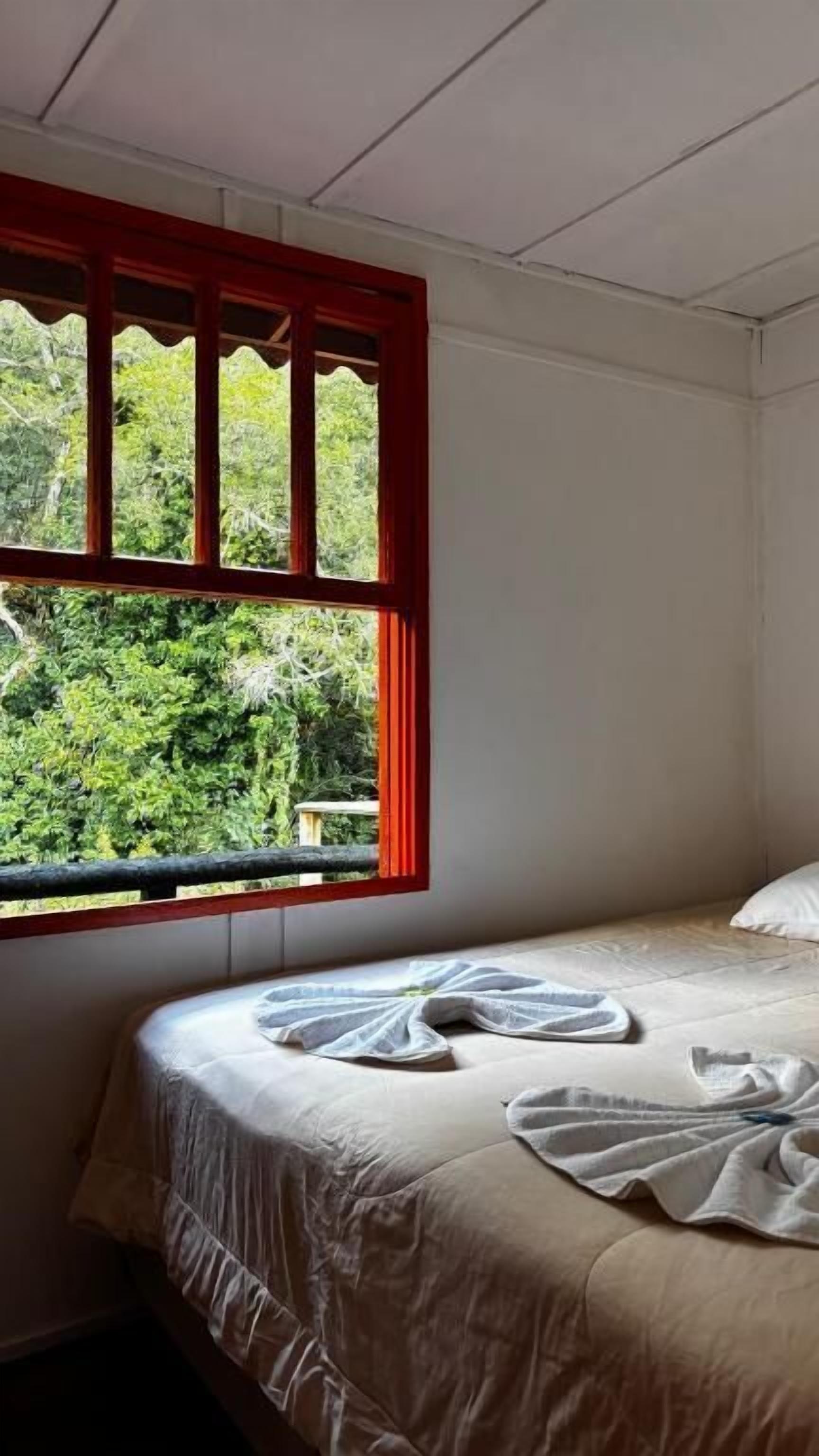 Casa, lanai, vista al jardín | Acceso para silla de ruedas 