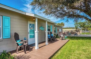 A house with a porch, outdoor seating, and a mailbox. - Charming St. Augustine Retreat Near Butler Beach with AC (St. Augustine)