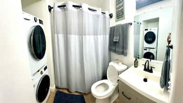 Hair dryer, towels, soap, toilet paper