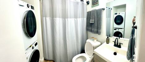 Hair dryer, towels, soap, toilet paper