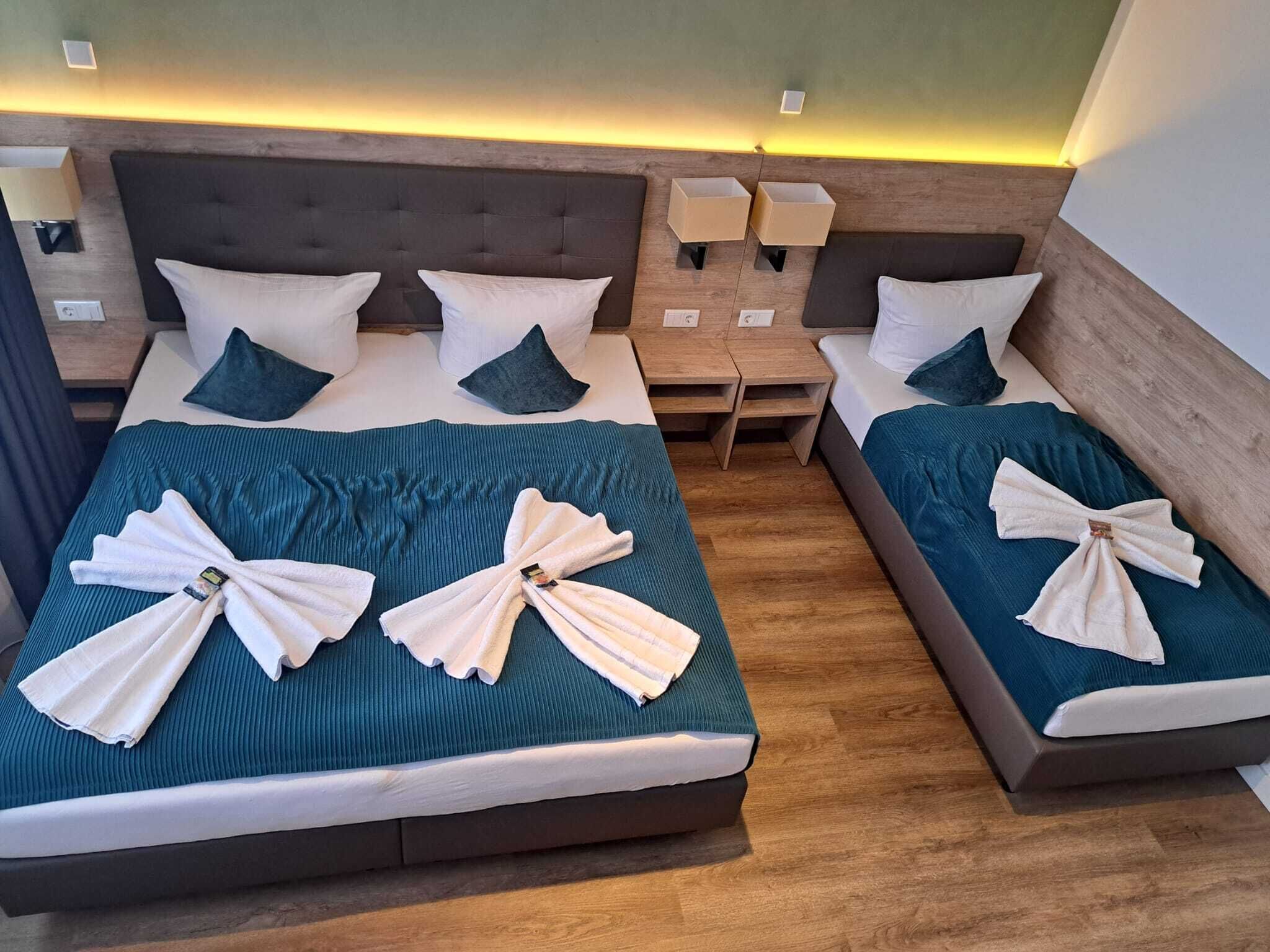 Comfort Triple Room, Courtyard View | Laptop workspace, free WiFi