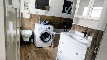 Hair dryer, towels, soap, toilet paper