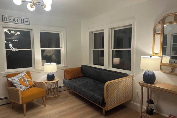 Large open plan living/kitchen/dining is cozy at night.