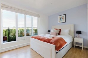 2 dormitorios, tabla de planchar con plancha, Internet y ropa de cama