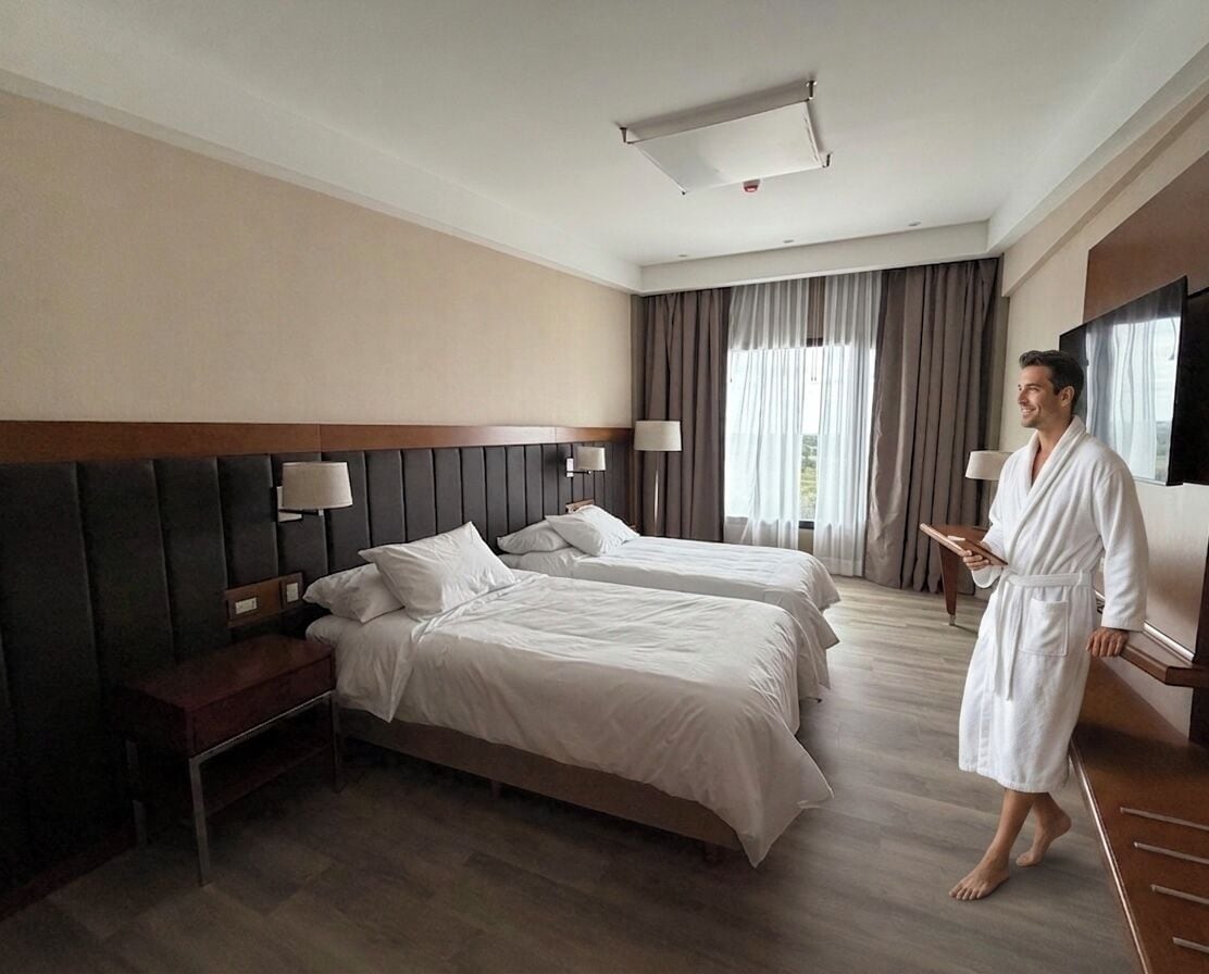 Standard Double or Twin Room, River View | In-room safe, desk, laptop workspace, free WiFi