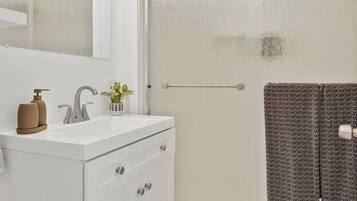 Hair dryer, towels, soap, shampoo
