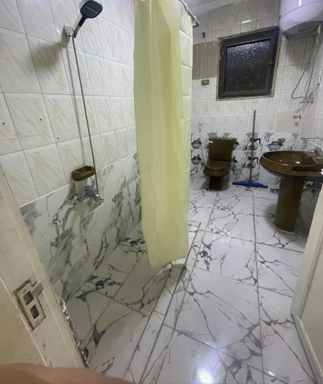 Shower, towels, soap, toilet paper
