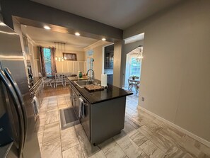 Fridge, microwave, oven, stovetop - Tremendous 3-bedroom with 2.5 bath updated home in uptown Oklahoma City (Oklahoma City)