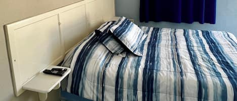 Blackout drapes, iron/ironing board, free WiFi