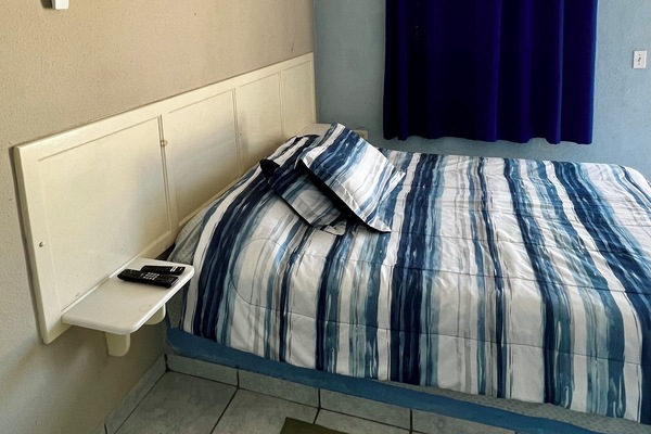 Blackout drapes, iron/ironing board, free WiFi