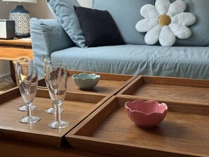 A wooden tray with three clear glasses and a pink bowl on a table. - Vacation Rental in the Heart of Saint-Cast - 80 m from Grande Plage   (ST CAST LE GUILDO)