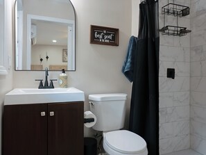 Shower, towels, toilet paper