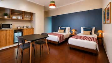 Cofres nos quartos, Wi-Fi de cortesia, roupa de cama
