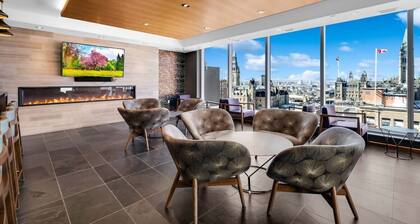 Walk to Parliament from this high-end condo w/gym