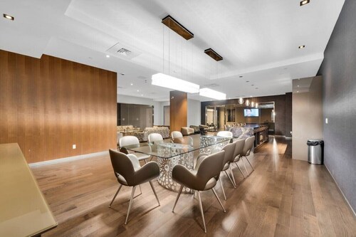Walk to Parliament from this high-end condo w/gym