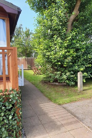 Terrace/patio - Wooden lodge with front decking sleeps 9 people (Fleetwood)