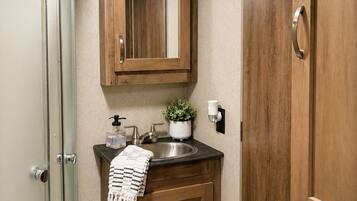 Hair dryer, towels, soap, shampoo