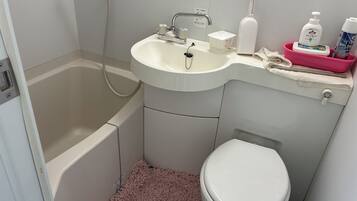 Basic Single Room, Garden View | Bathroom | Combined shower/tub, hair dryer, towels, soap