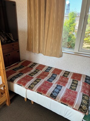 Basic Single Room, Garden View | Desk, laptop workspace, free WiFi, bed sheets - Heiwafukushiyukoukan (Sapporo-shi Toyohira-ku)