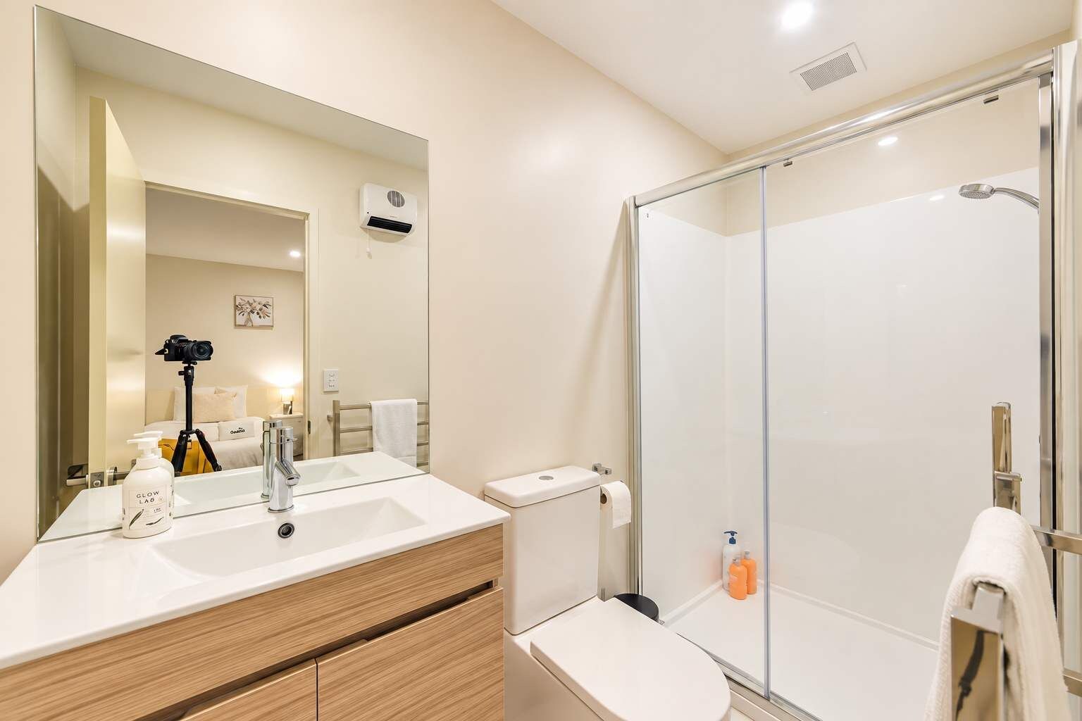 Shower, hair dryer, towels, shampoo