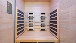 A wooden-paneled elevator with multiple storage compartments. - Gorgeous apartment in Kappeln with sauna (Kappeln)