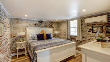 1 bedroom, desk, iron/ironing board, travel crib