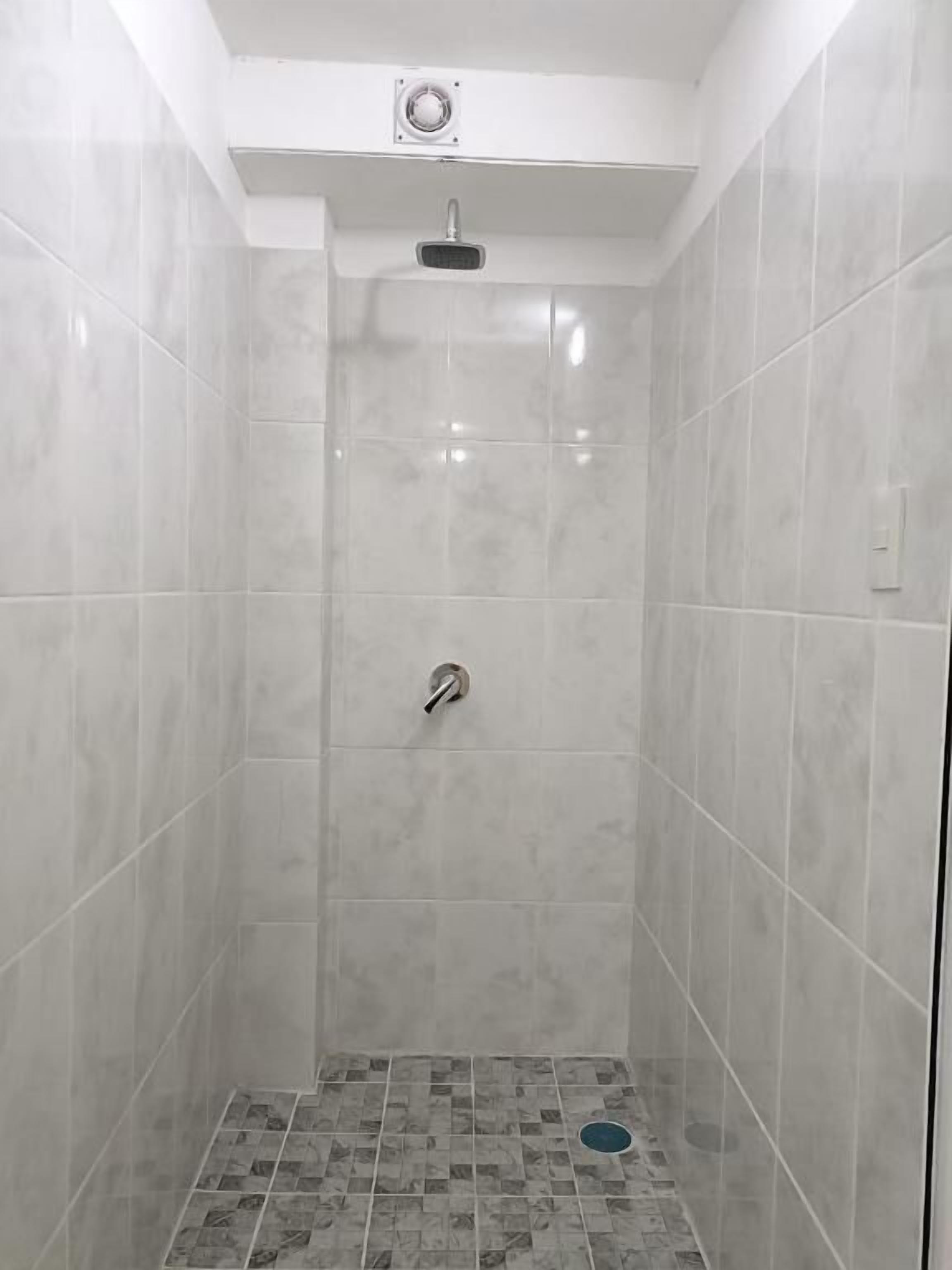 Standard Shared Dormitory, Balcony | Bathroom | Shower, rainfall showerhead, hair dryer, soap