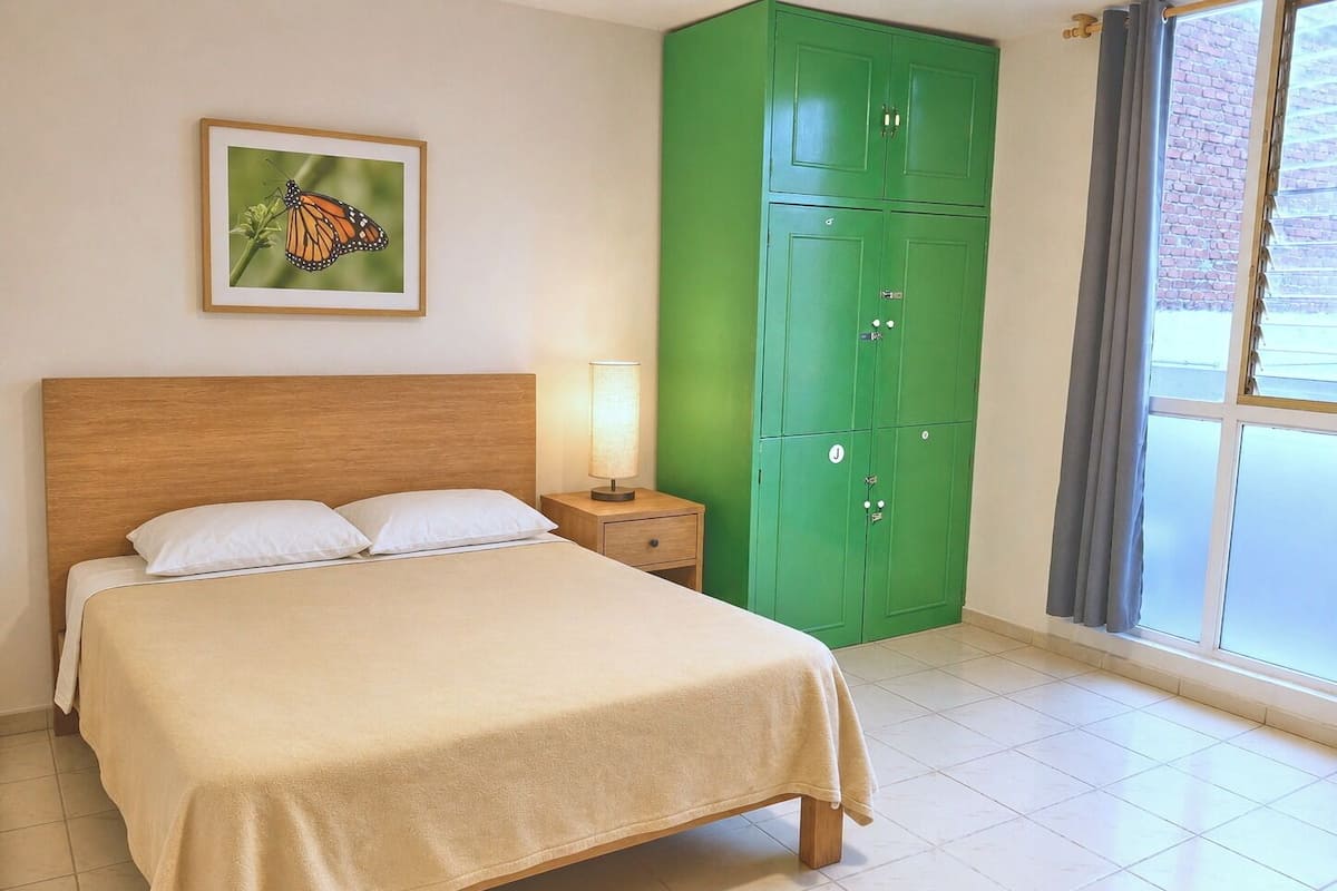 Habitación cuádruple estándar, vista al jardín | Wifi gratis y ropa de cama 