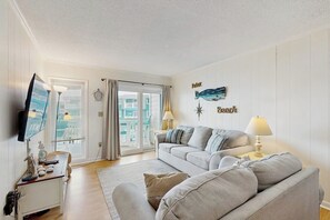 Living area - Oceanview condo with pool, private balcony & direct beach access (Murrells Inlet)