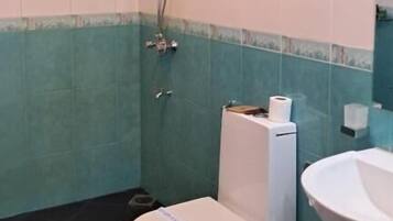 Family Room, Balcony, Garden View | Bathroom | Shower, free toiletries, toilet paper