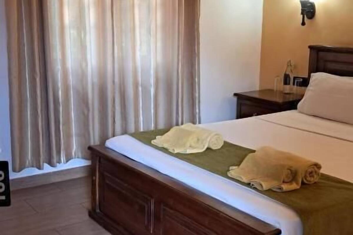 Chambre Double Standard, vue jardin | Coffres-forts dans les chambres